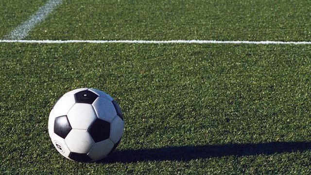 soccer-ball-on-grass-field-jpg